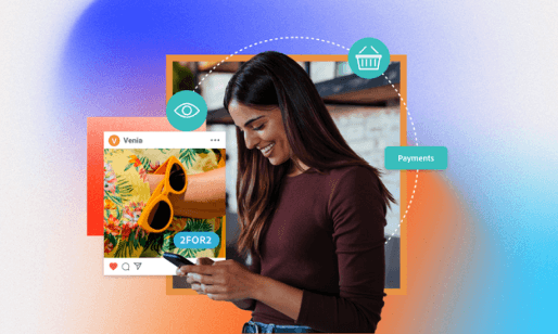 a woman looking at her phone and smiling